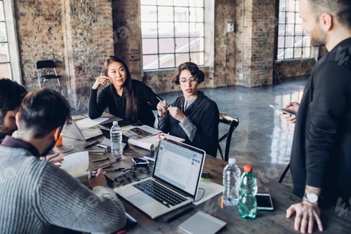 Preview: Designers having meeting in studio