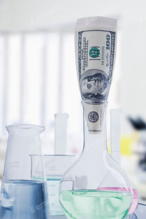 Preview: One hundred dollar bill in flat bottomed glass chemistry flask