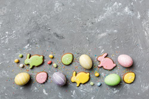 Preview: holiday preparation Multi colors Easter eggs with cookies on colored background