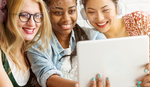 Preview: Women Friends Using Digital Tablet Concept