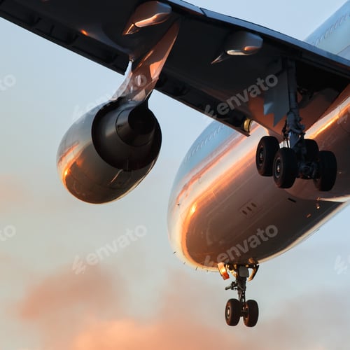Preview: Airplane ready to landing or takeoff at sunset, bottom view, close up of wing, engine and chassis/