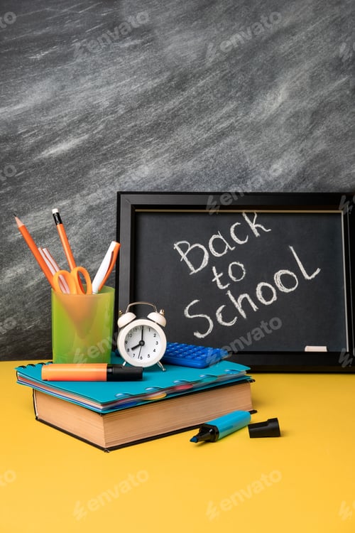 Preview: colorful school supplies and blackboard with letters back to school.