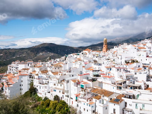 Picturesque White Village nestled in Andalusian Hills, Spain