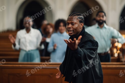 Preview: Pastor preaching and gesturing to congregation in church