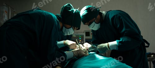 Preview: Medical team of surgeons in hospital doing invasive surgical interventions