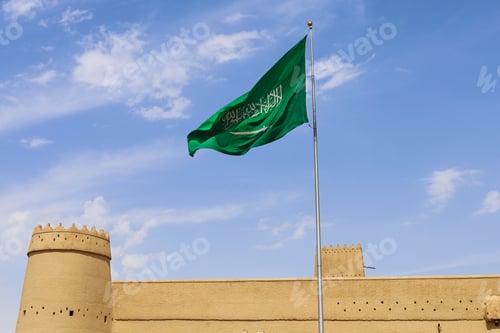 Preview: Riyadh, Saudi Arabia, a waving Saudi flag on Al Masmak Palace - National Day Saudi founding day