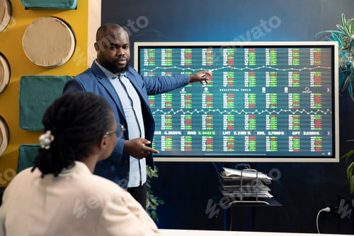 Preview: Business analyst making a pitch presentation with annual infographics