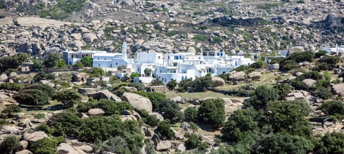 Preview: Greece. Tinos island Cyclades. Panoramic view of house at Volax village, granite stone background.