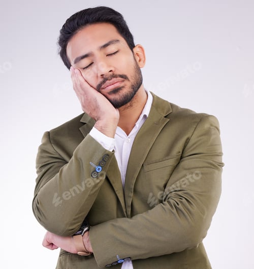 Preview: Tired, bored and Asian man sleeping for rest isolated on a white background in a studio. Dream, you