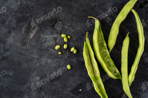 Preview: flat lay young natural organic bean pod isolated, copy space for your texts