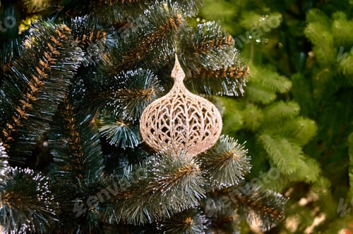 Preview: Beautiful toy on the Christmas tree. Winter holiday concept, home and interior decoration.