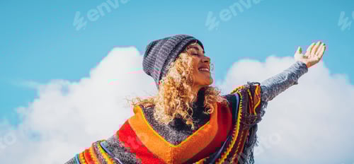Preview: Overjoed adult woman outstretching arms with happy posture. Life balance and happiness