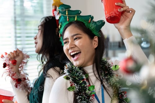 Preview: Festive Coworkers Celebrate Holiday at Workplace Gathering