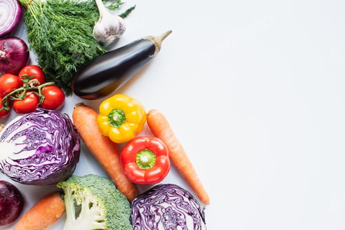 Preview: top view of colorful assorted fresh vegetables on white background