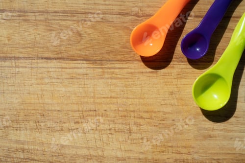Preview: Used kitchen cutting board with measuring spoons