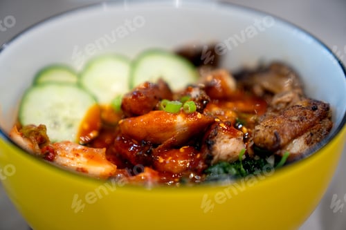 Preview: Grilled chicken has rice and zucchini carrot tomato in plate on wood background, top view, healthy
