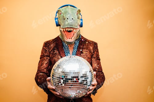 Preview: Crazy happy man dancing disco music wearing t-rex mask - Focus on face