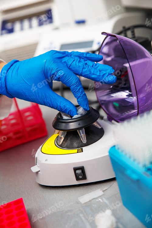 Preview: Close up of scientist hand during scientific experiment in laboratory.