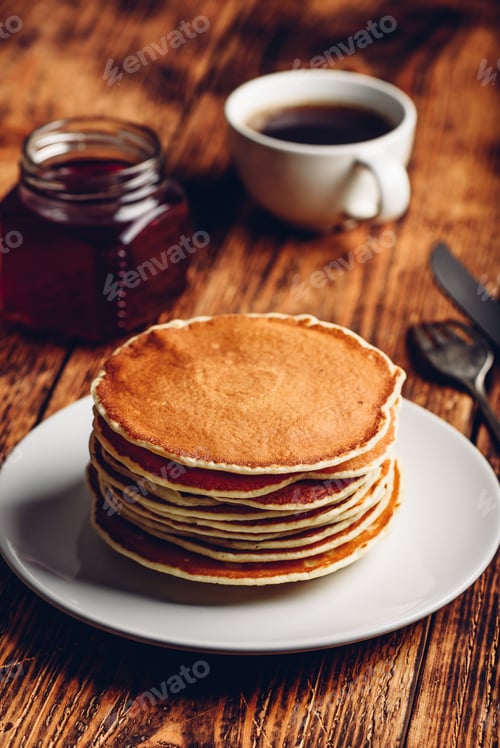 Preview: Stack of pancakes on white plate