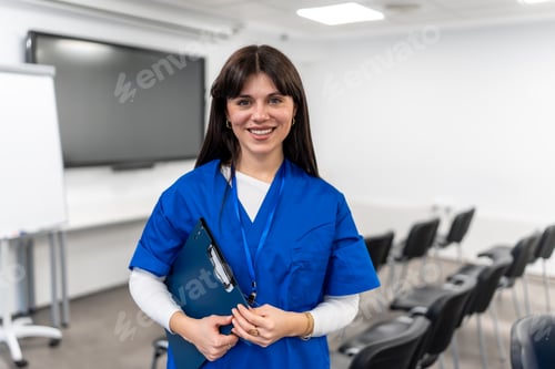 Preview: Healthcare professional holding clipboard in modern learning environment