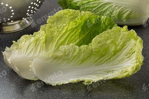 Preview: Pair of fresh raw Chinese cabbage leaves close up