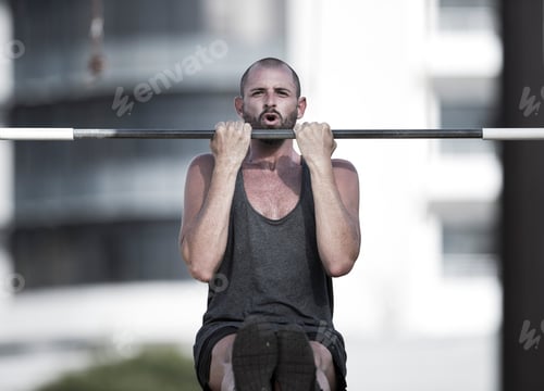 Preview: Portrait of sportsman doing chin-ups