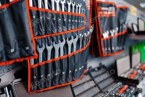 Preview: Showcase with wrenches kits in tool store closeup