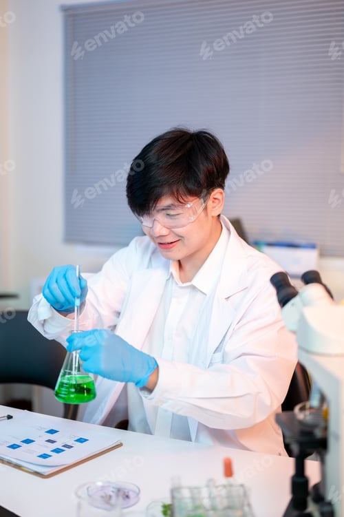 Preview: Scientist researcher man in lab gown and gloves holding glass conical flask looking at test liquid.