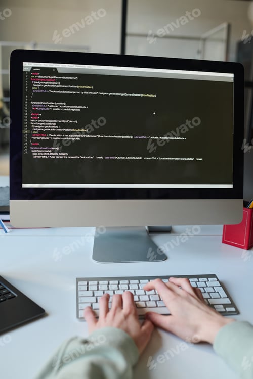 Preview: Programmer typing codes on computer