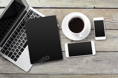 Preview: Open laptop with digital tablet and smartphone close up