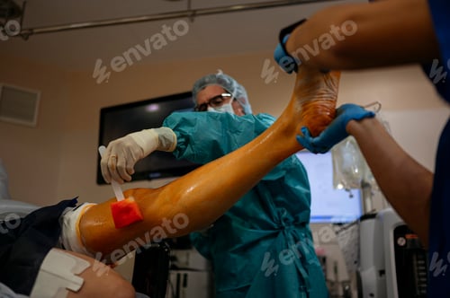 Preview: Team of surgeons operating in the hospital. Healthcare concept