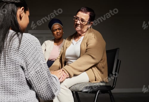 Preview: Support, women holding hands and group therapy with understanding, sharing feelings and trust talki