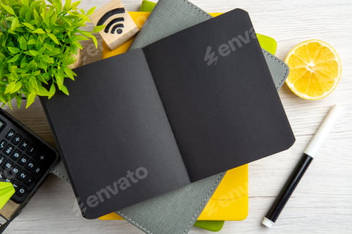 Preview: top view dark notepad with copybooks on a white background regime business schedule job color work