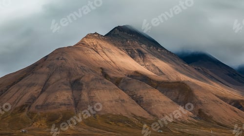 Preview: Majestic Svalbard mountain landscape illuminated by soft sunlight under cloudy skies