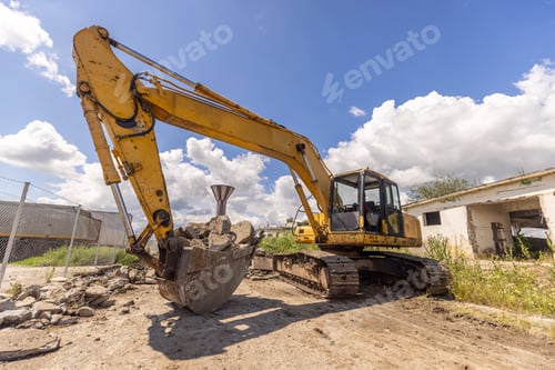 Preview: Crawler excavator on demolition site.