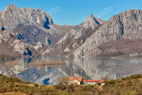 Preview: Picturesque reservoir and mountain landscape in Riano. Mirror effect. Spain