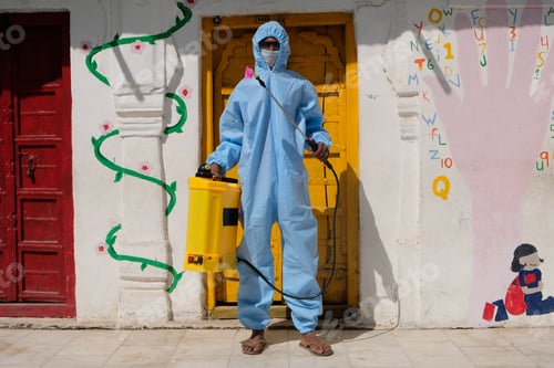 Preview: Indian sanitary worker conducting disinfection of the interior during the COVID-19 pandemic