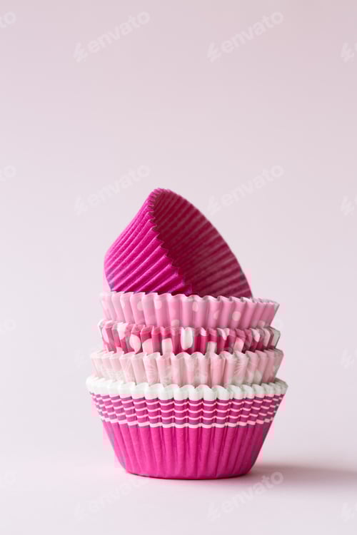 Preview: Stack of Pink Cupcake Liners on Pink Background