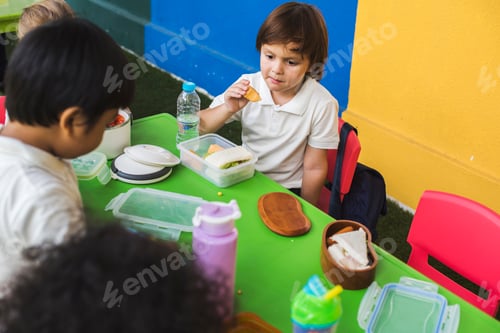 Preview: Group of Kindergarten Students Eating Food Lunch Break Together