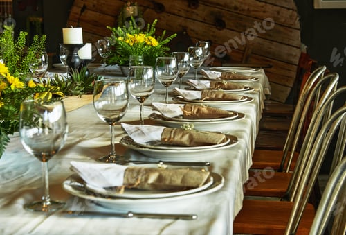 Preview: Laid table with cutlery and crockery in the sunset sunlight