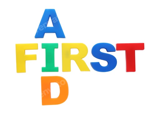 Preview: Words First Aid made of colorful letters isolated on white, top view