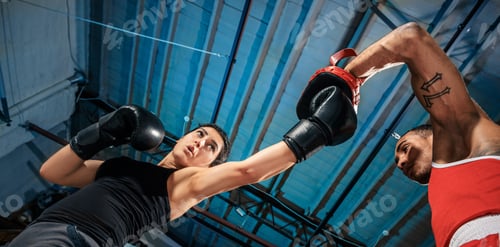 Preview: Woman and Man Boxing, Low Angle