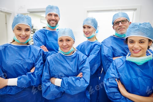 Preview: Smiling Medical Team in Surgical Garb