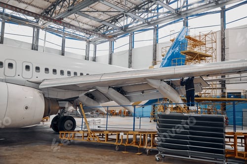 Preview: Professional plane expluatation service in big hangar