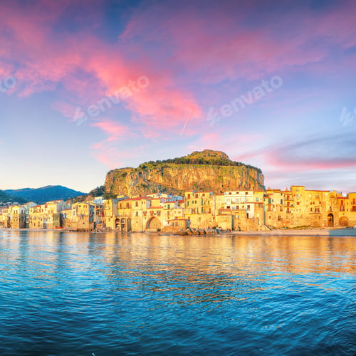 Preview: Scenic evening cityscape of Cefalu city.