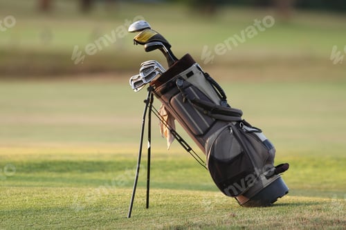 Preview: Closeup of a golf bag with clubs in a golf course