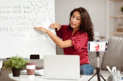 Preview: Woman Teaching Math Online from Home