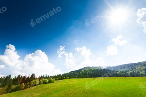 Preview: Green field with barn, mountains on background
