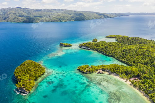 Preview: High angle shot of the Raja Ampat Islands surrounded by the Indo-Pacific Ocean