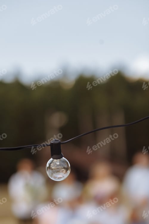 Preview: Light bulb on bokeh background